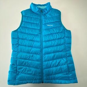 light blue marmot vest